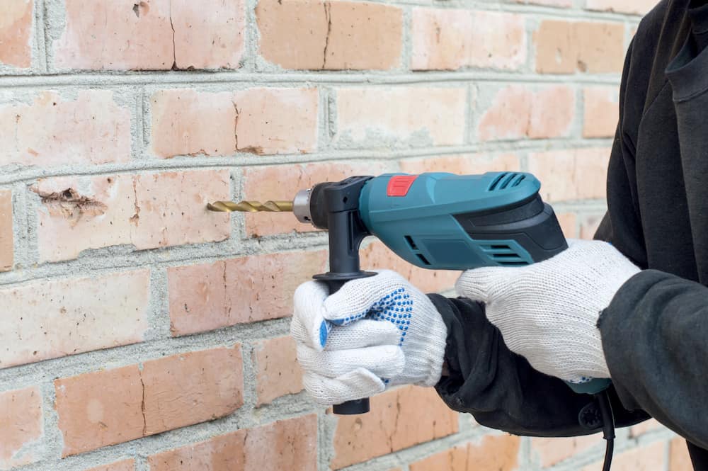 tips on how to drill into brick without a hammer drill