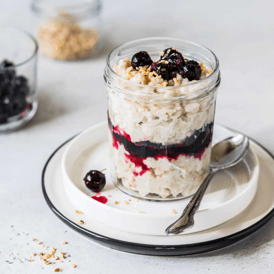 blackcurrant_04 Layered Creamy Oat Porridge in a Jar with Blackcurrants